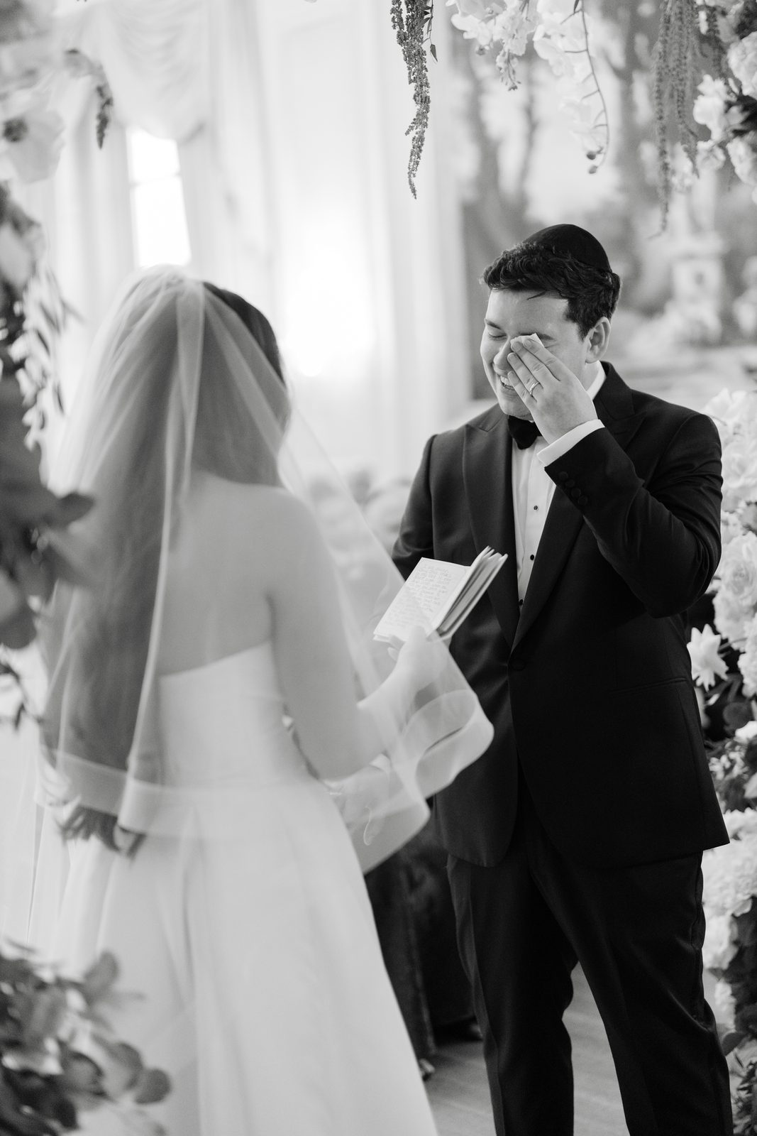 An emotional moment under the chuppah at Oheka Castle