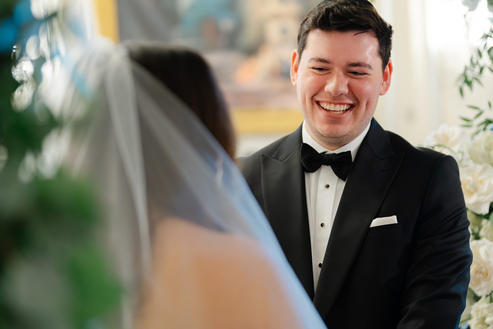 Ian watching Rachel come down the aisle at Oheka Castle