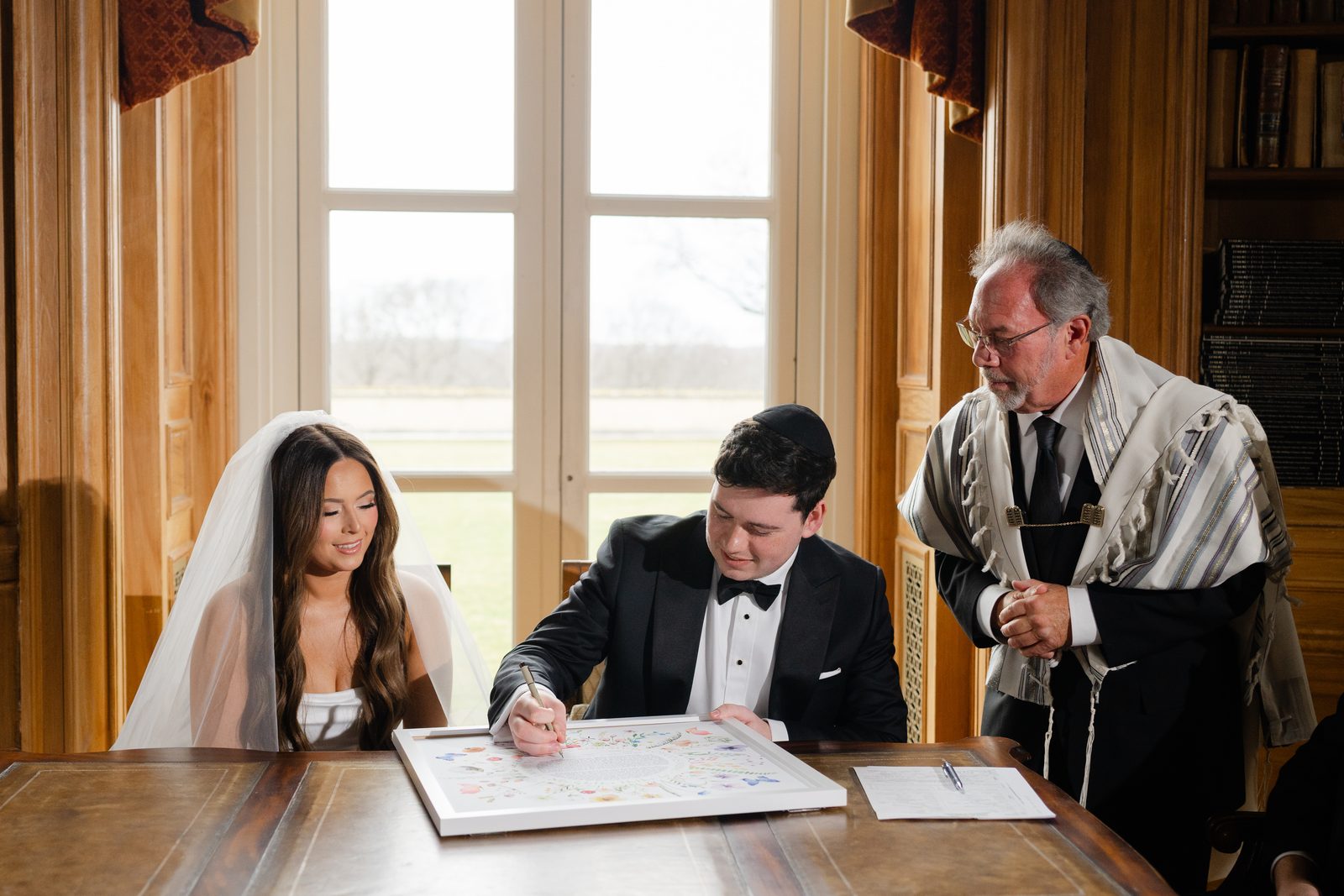 The ketubah signing before the ceremony at Oheka Castle