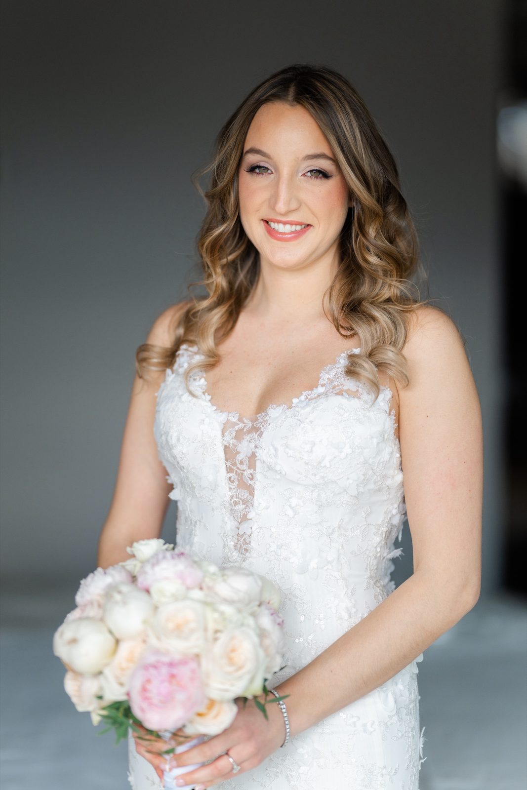 Bridal portrait of Amanda with her bouquet