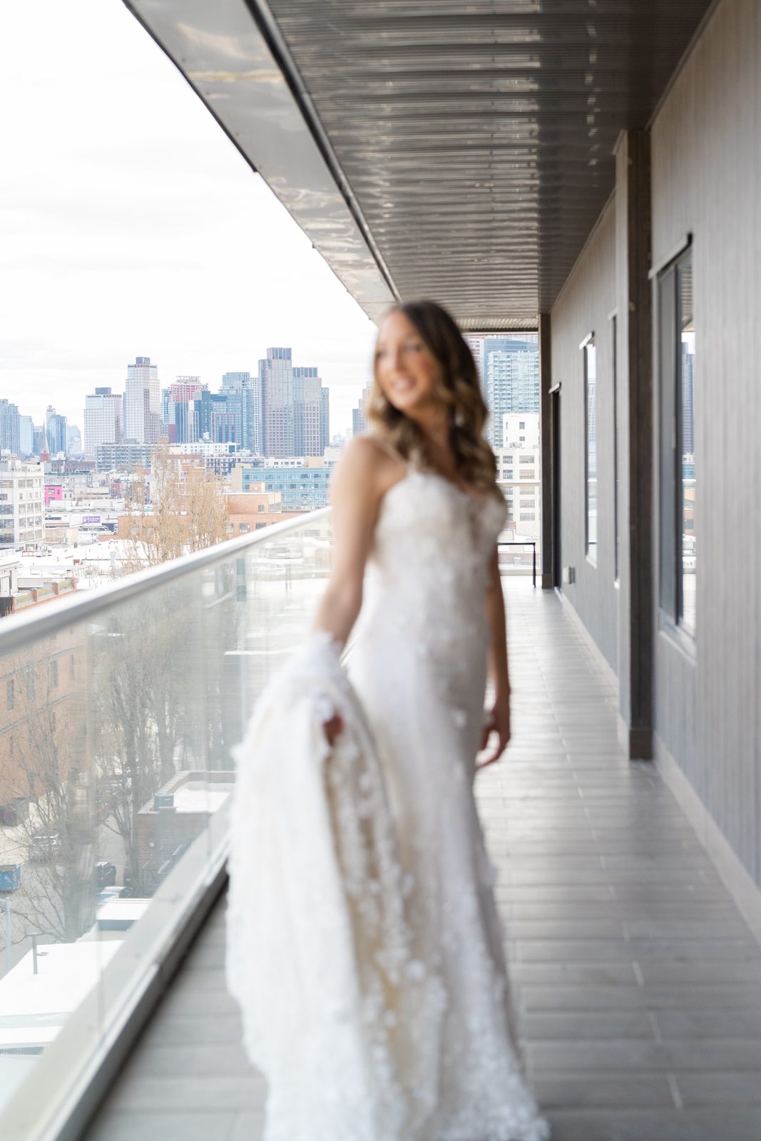 Amanda in her gown on the hotel balcony