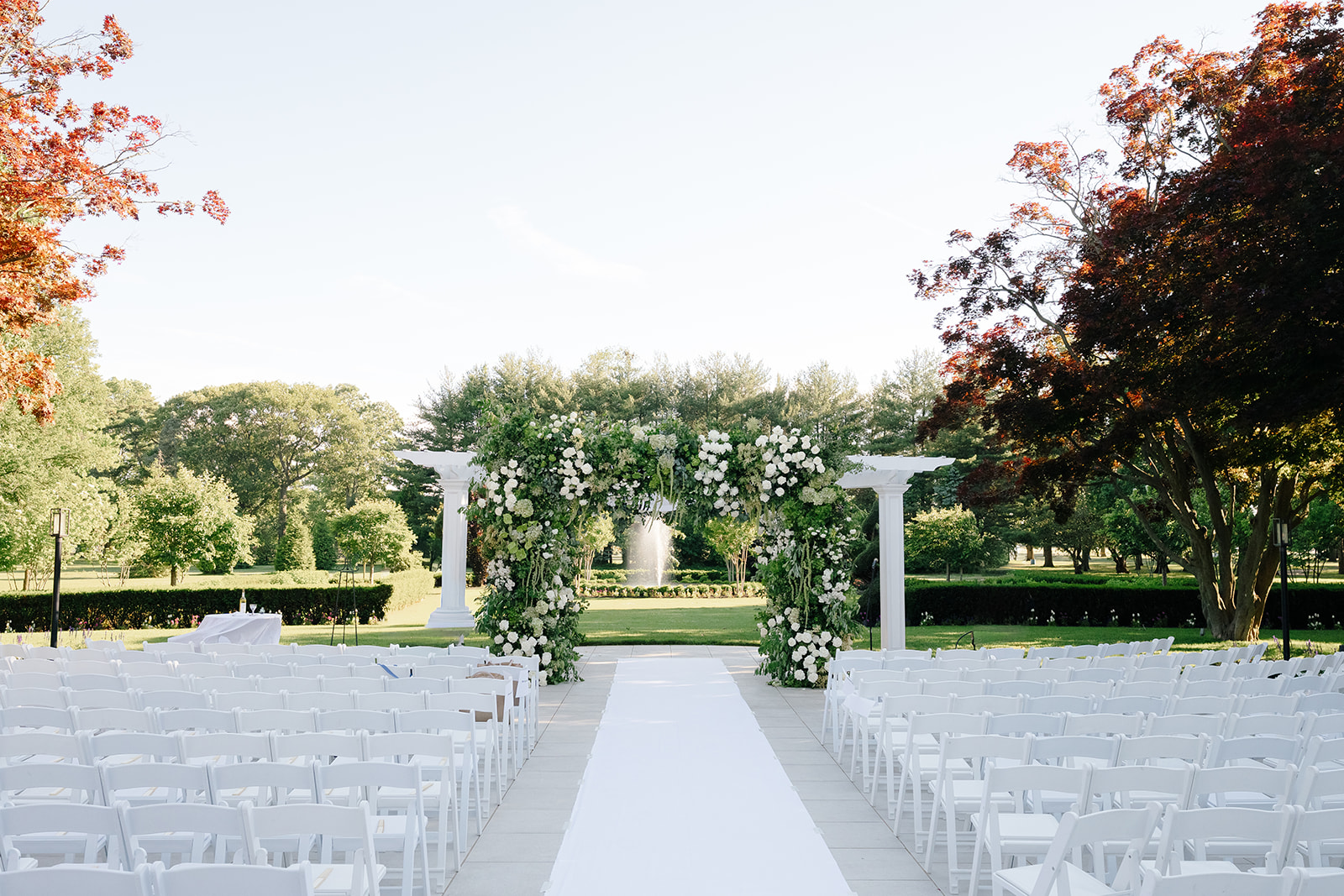 Detail from Rebecca and Phil’s June wedding at The Lannin — white florals and classic stationery