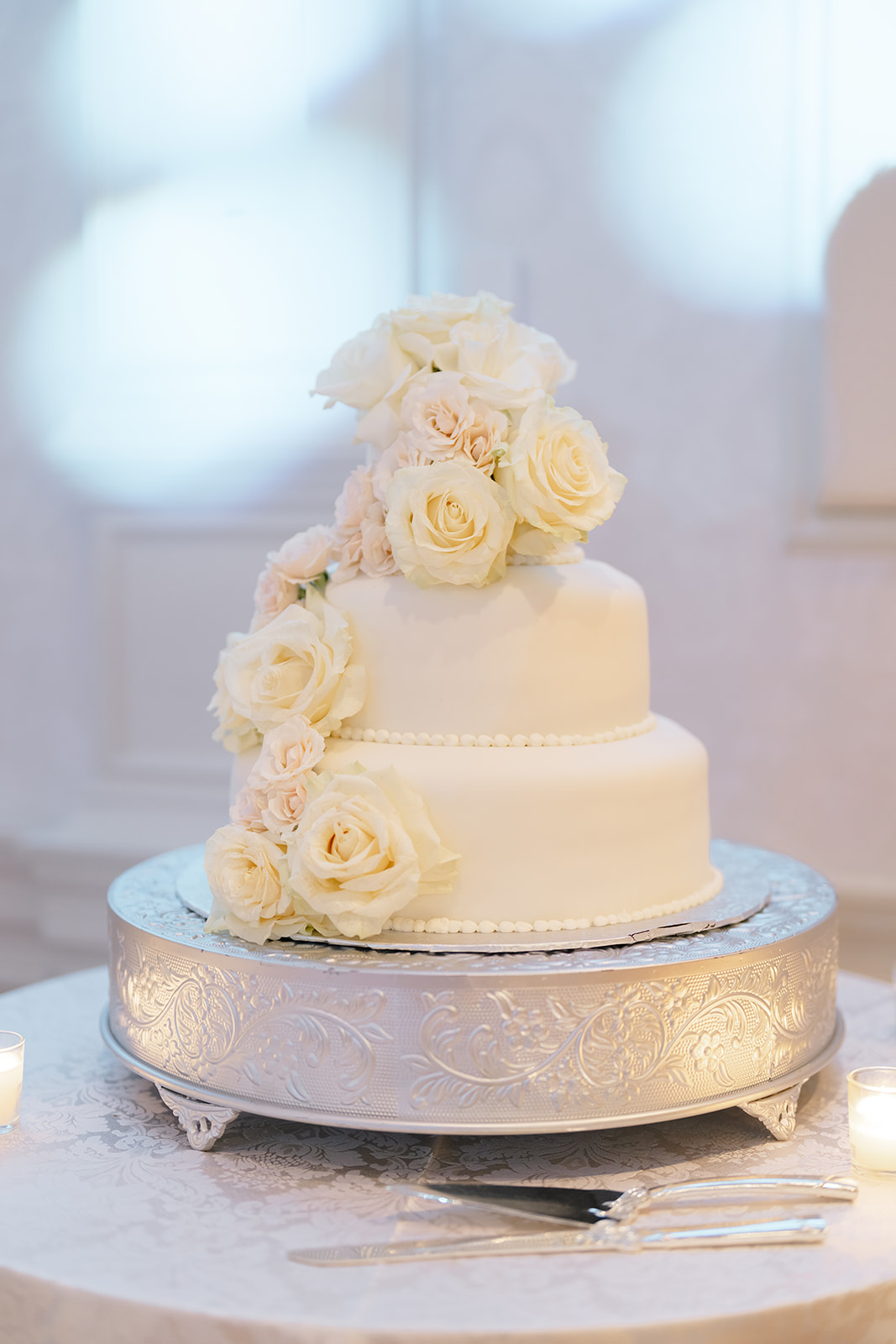 Detail from Rebecca and Phil’s June wedding at The Lannin — white florals and classic stationery