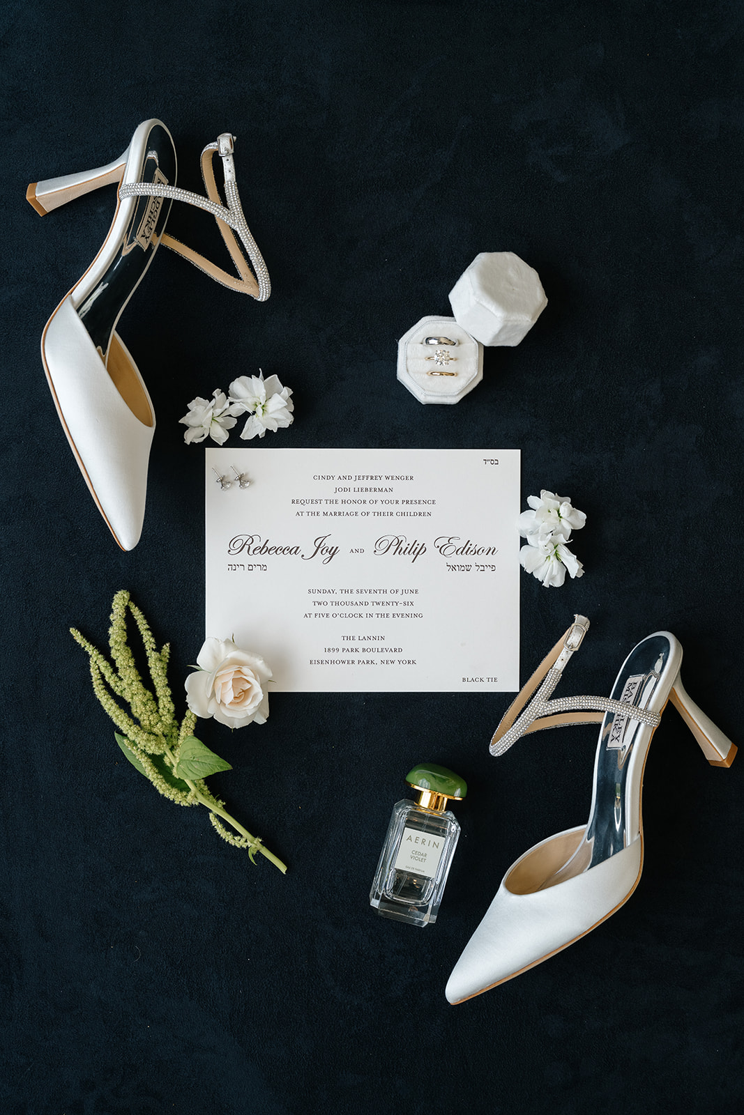 Detail from Rebecca and Phil’s June wedding at The Lannin — white florals and classic stationery