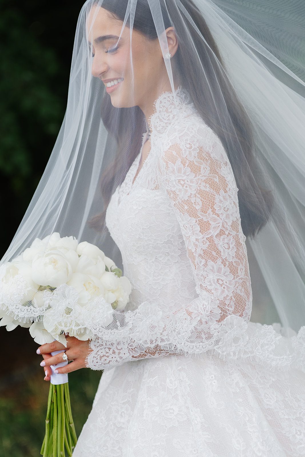 Bride under her veil with white bouquet, Edgewood Country Club wedding