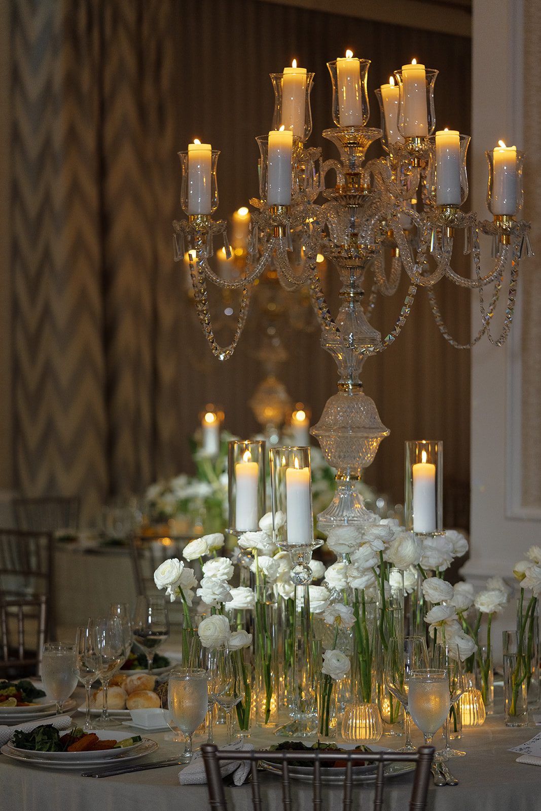 Crystal candelabra centerpiece with white flowers and candles at Edgewood Country Club