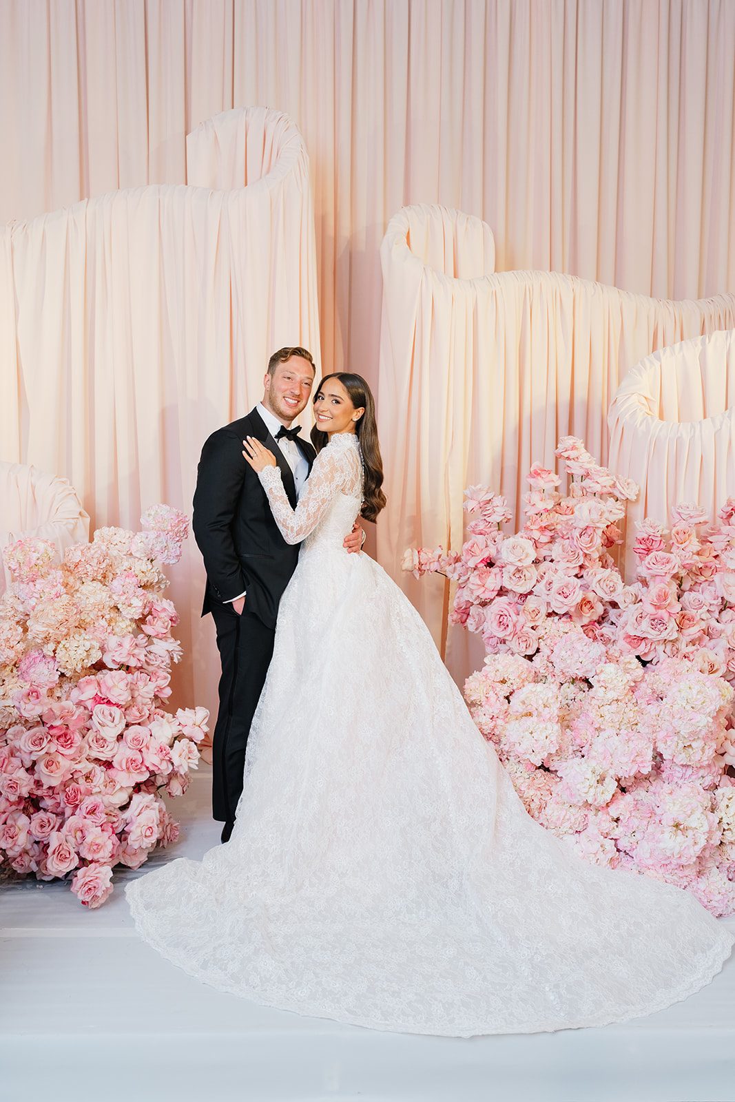 Rosalie and Josh with blush rose florals by Papaya at Edgewood Country Club
