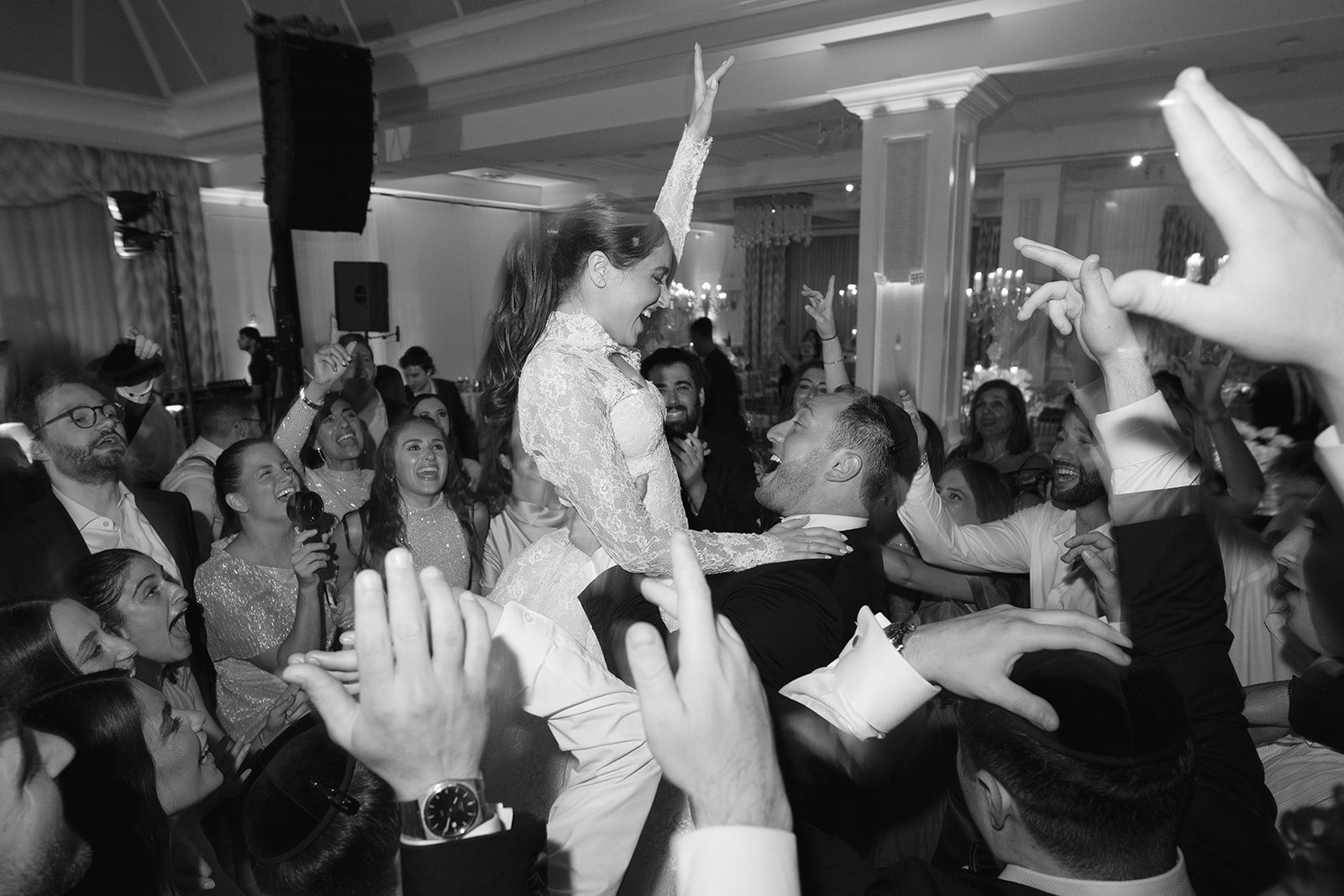 Packed dance floor in black and white at the Edgewood Country Club reception