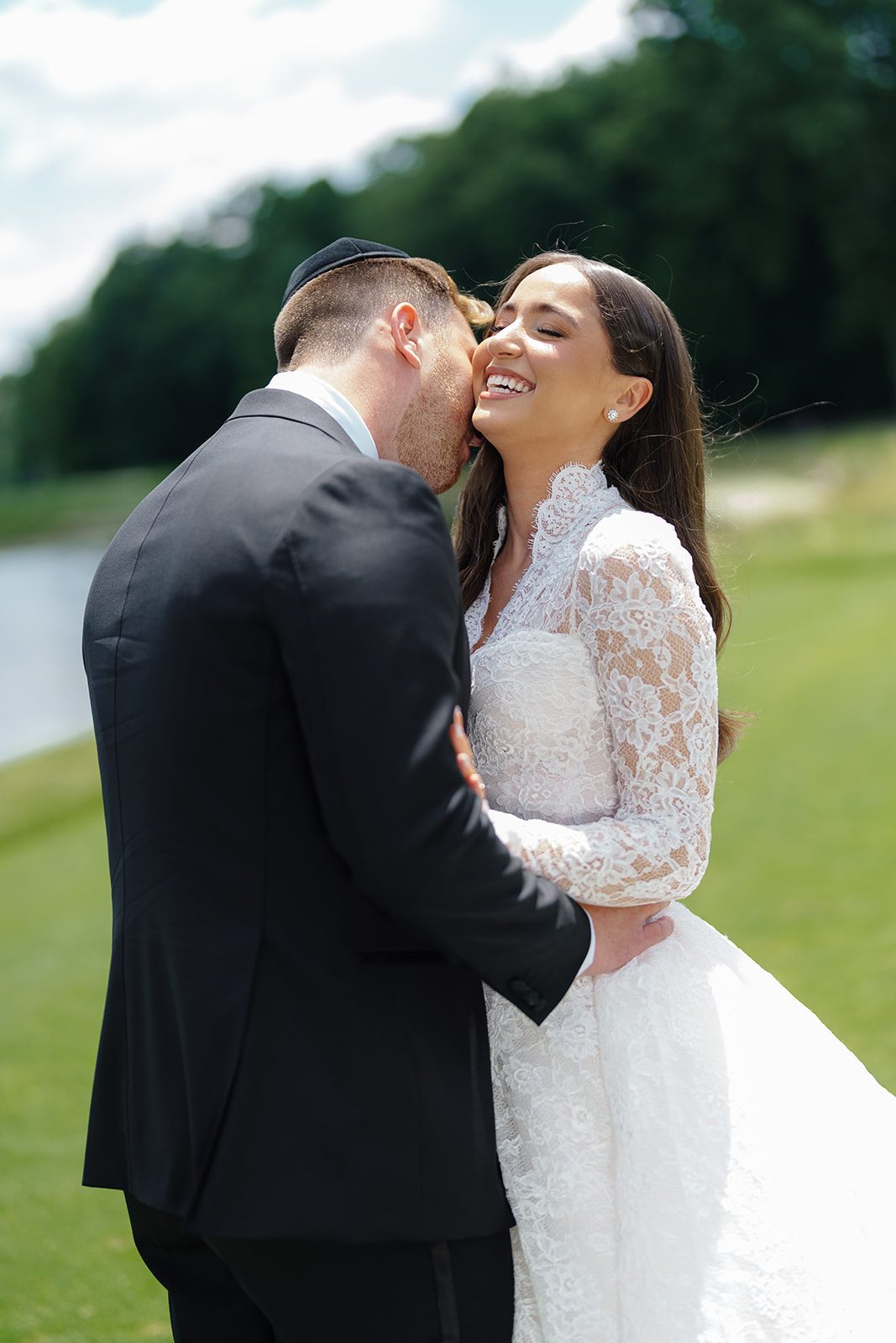 Josh kissing Rosalie on the golf course at Edgewood Country Club in River Vale NJ
