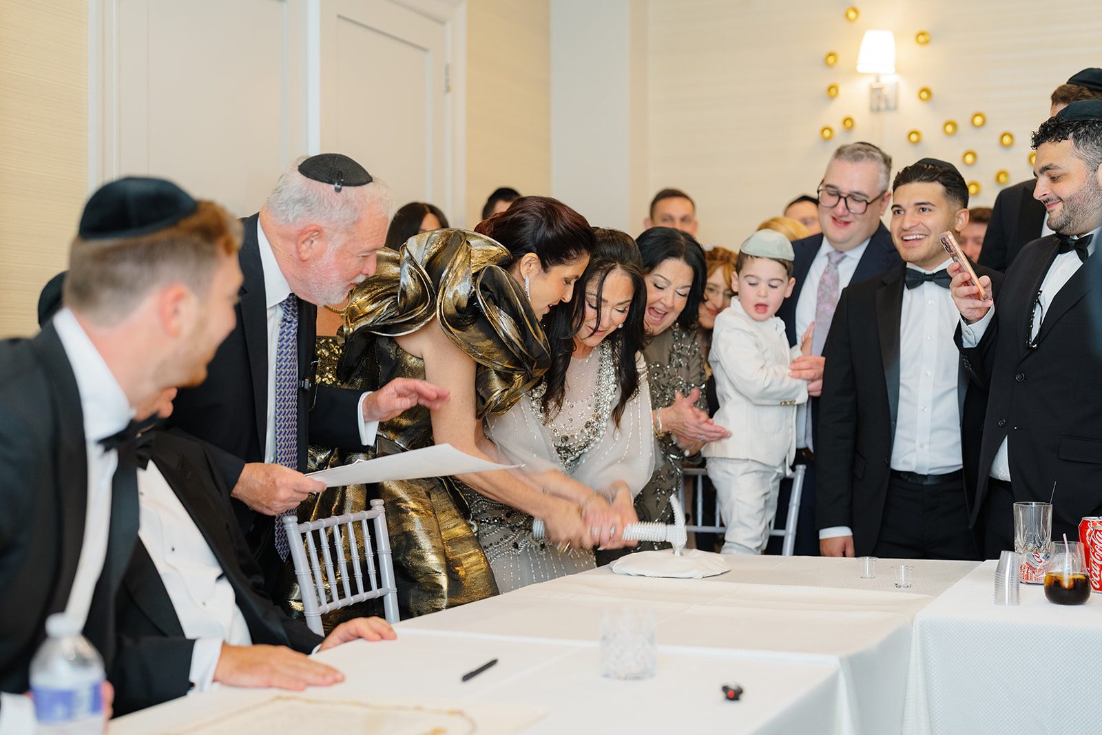 Handshakes and singing around the tisch table at Edgewood Country Club