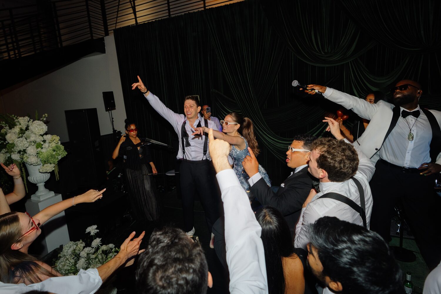 Arms raised and jackets off, the dance floor hits full volume.