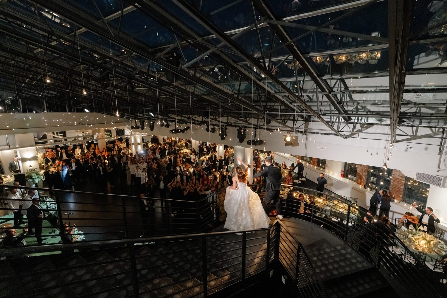 Seen from the balcony above, the reception fills the whole floor.