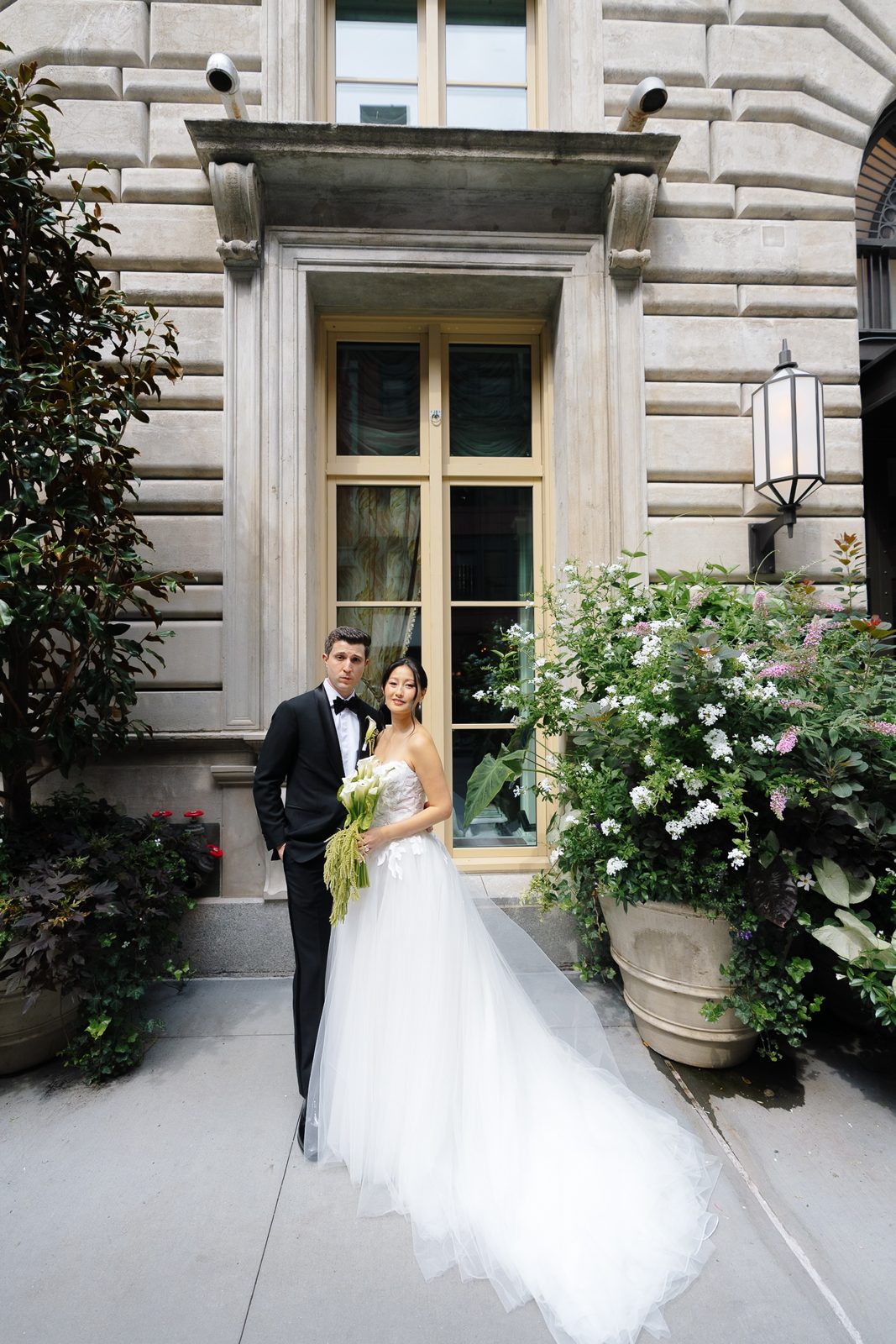 Family portraits at a Le Jardin sur Madison rooftop wedding