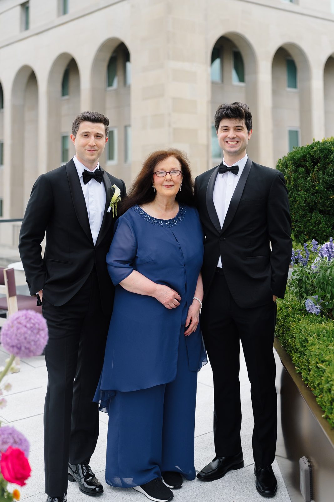 Family portraits at a Le Jardin sur Madison rooftop wedding