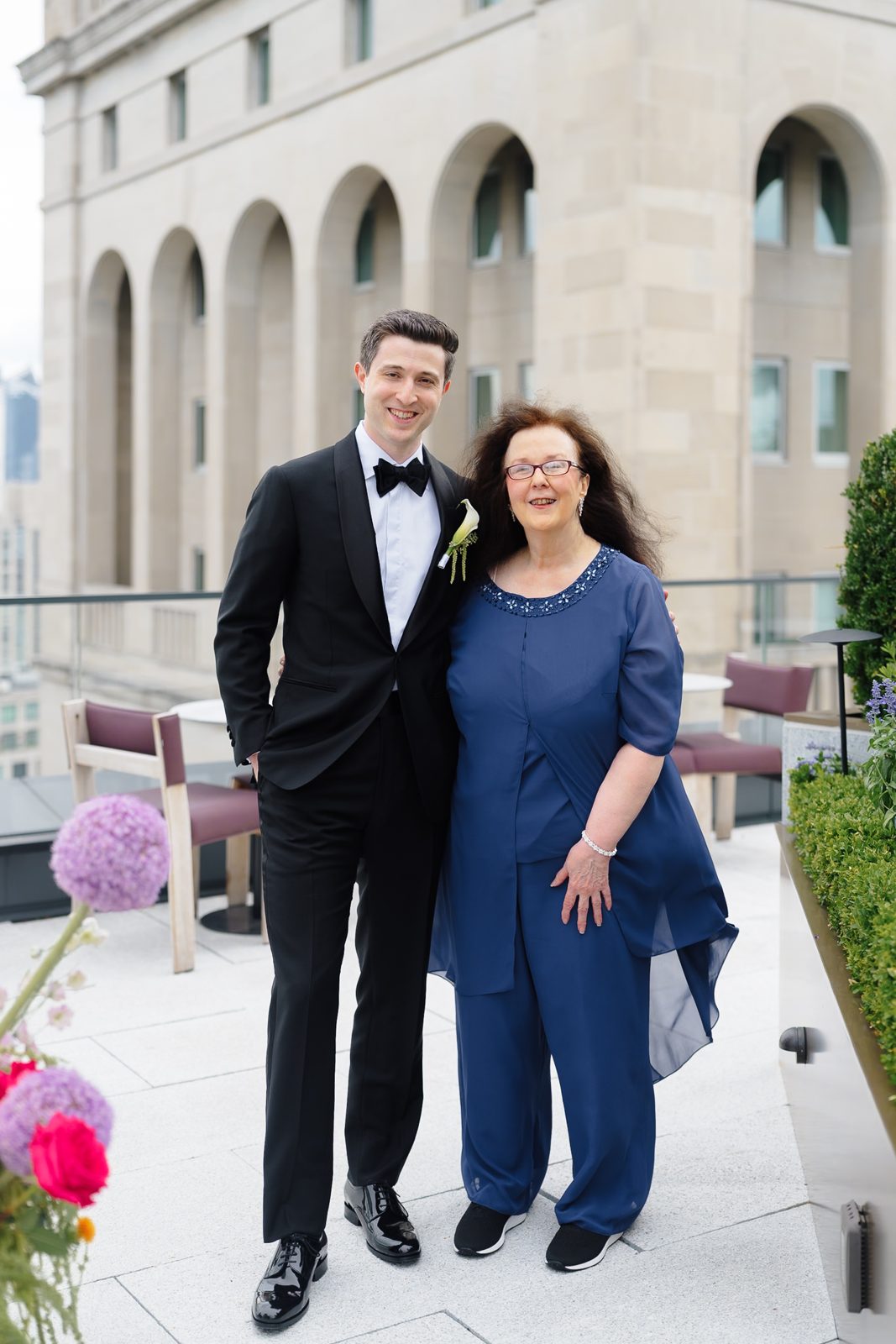 Family portraits at a Le Jardin sur Madison rooftop wedding