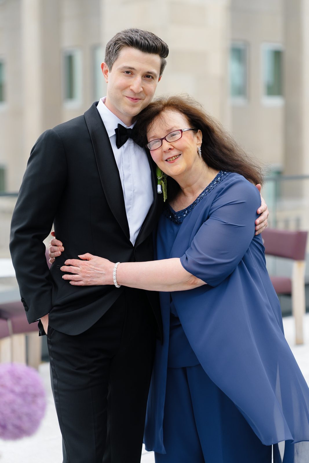 Family portraits at a Le Jardin sur Madison rooftop wedding