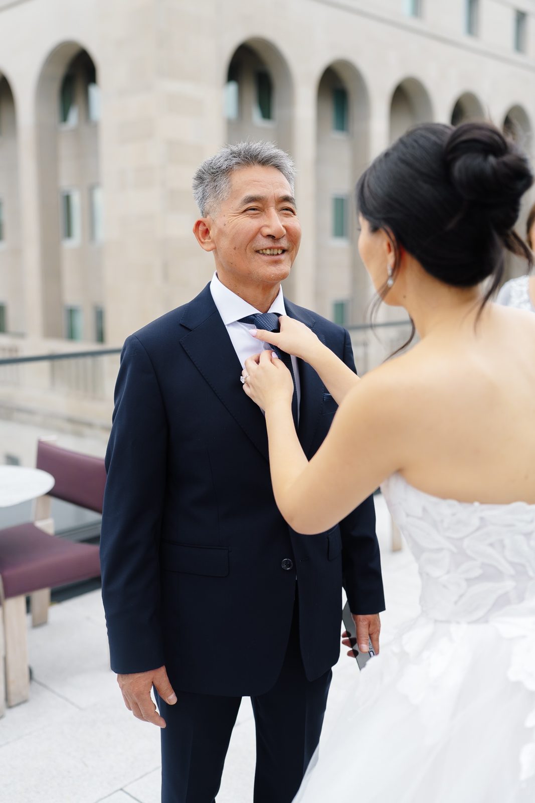 Family portraits at a Le Jardin sur Madison rooftop wedding