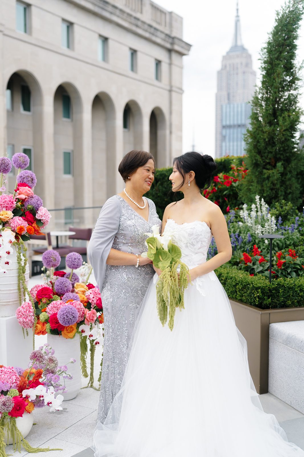 Family portraits at a Le Jardin sur Madison rooftop wedding