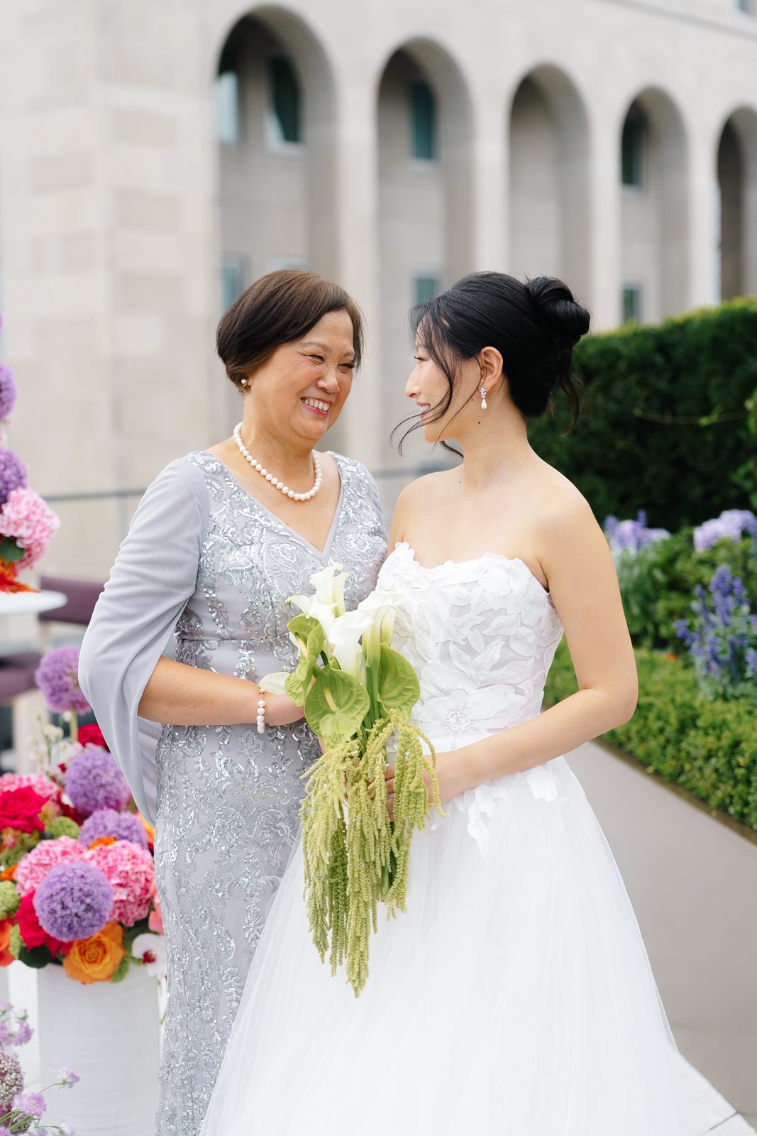 Family portraits at a Le Jardin sur Madison rooftop wedding