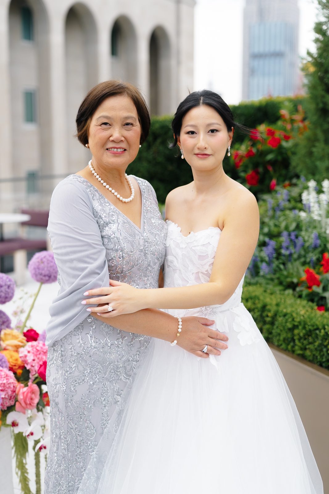 Family portraits at a Le Jardin sur Madison rooftop wedding