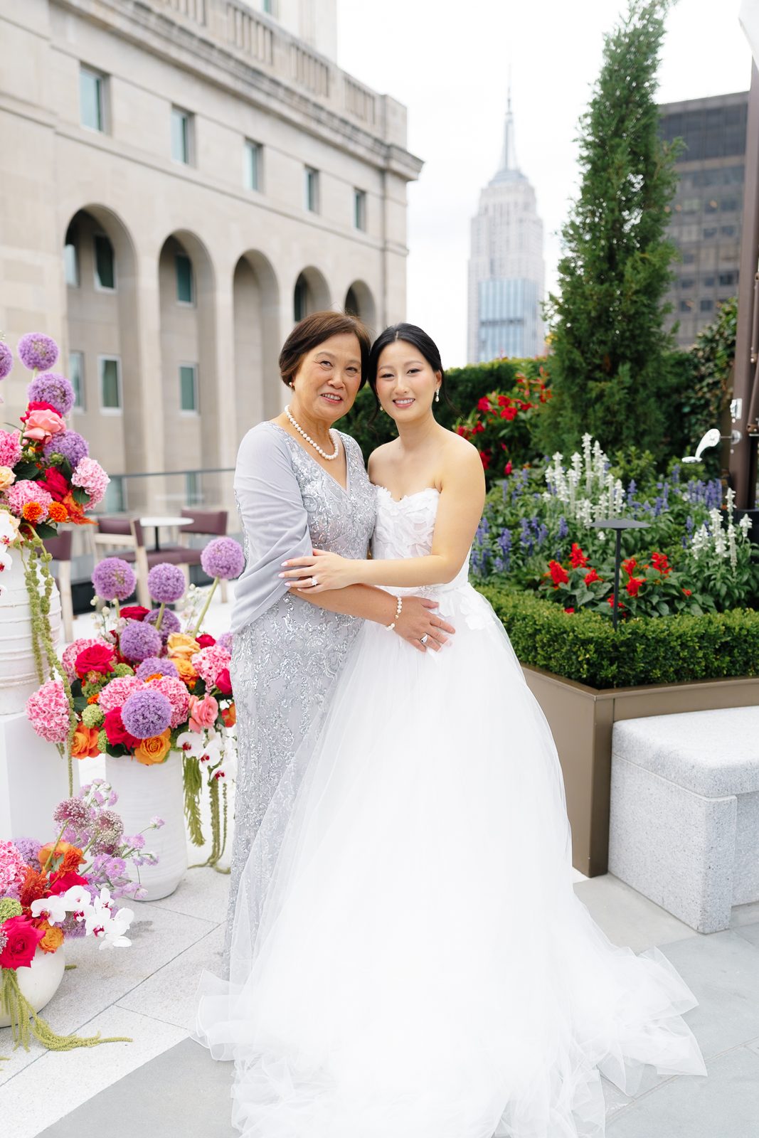Family portraits at a Le Jardin sur Madison rooftop wedding