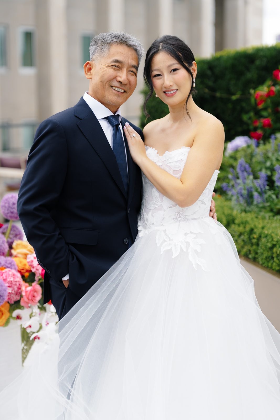 Family portraits at a Le Jardin sur Madison rooftop wedding