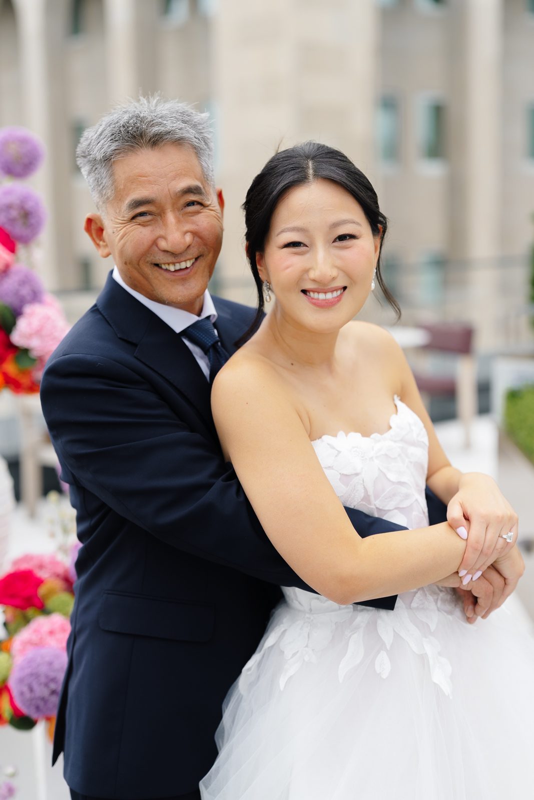 Family portraits at a Le Jardin sur Madison rooftop wedding