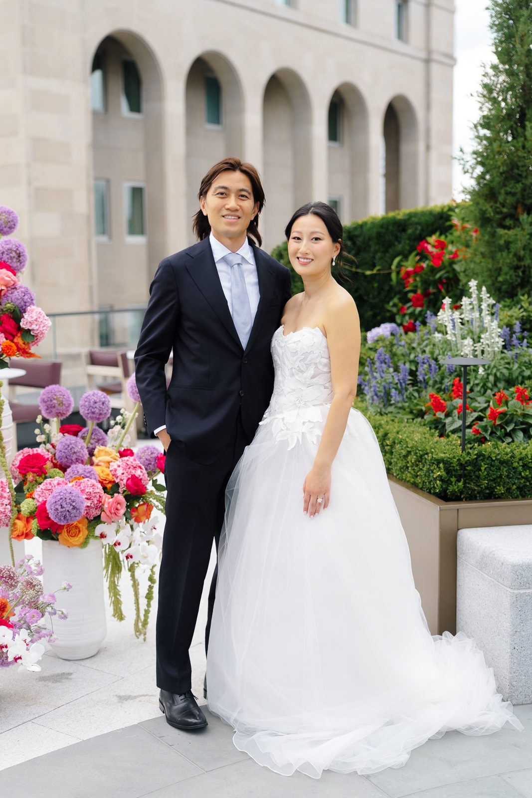 Family portraits at a Le Jardin sur Madison rooftop wedding