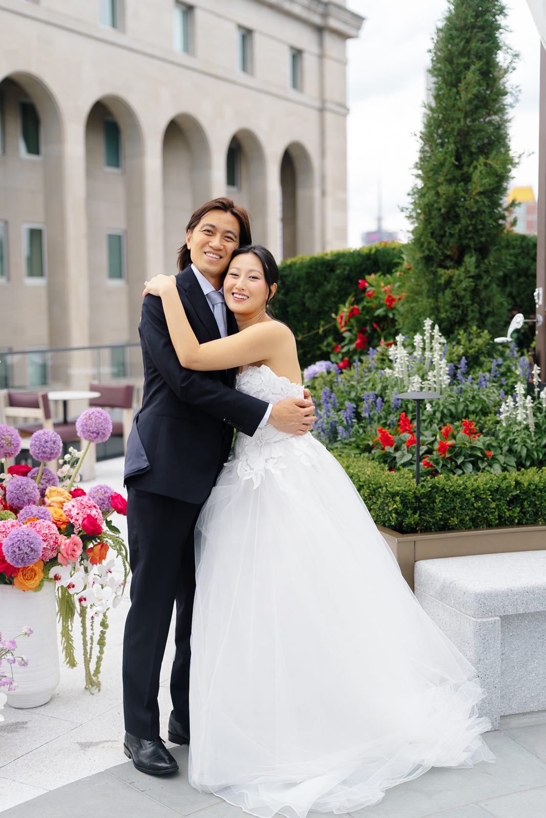 Family portraits at a Le Jardin sur Madison rooftop wedding