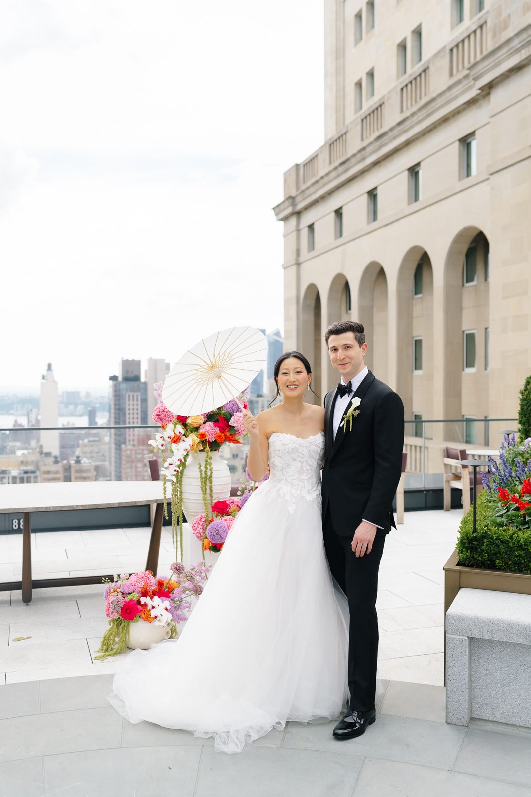 Family portraits at a Le Jardin sur Madison rooftop wedding
