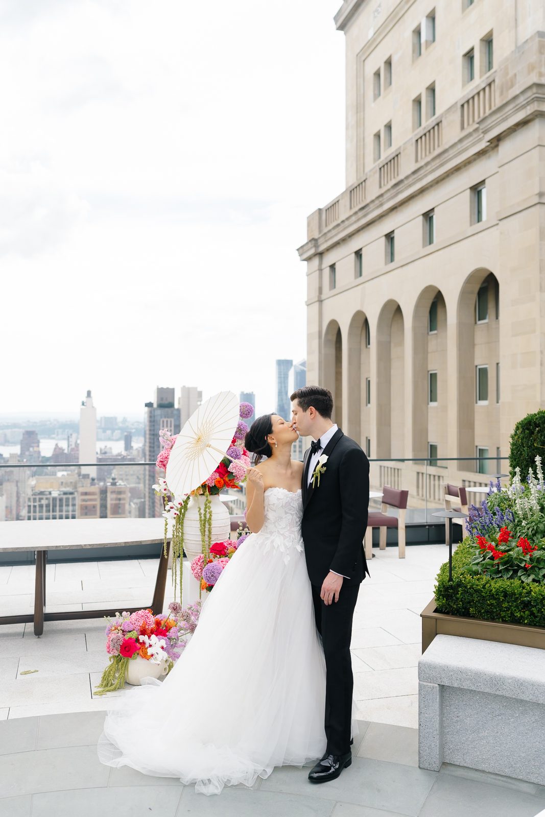 Family portraits at a Le Jardin sur Madison rooftop wedding