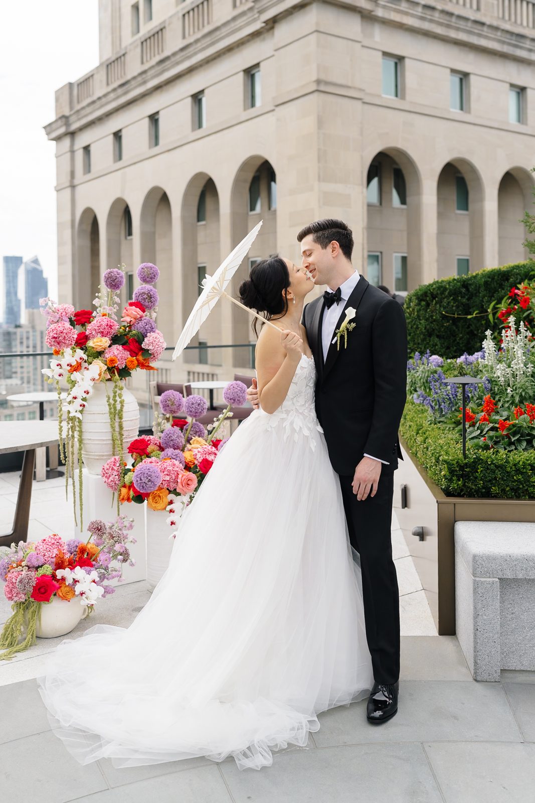 Family portraits at a Le Jardin sur Madison rooftop wedding