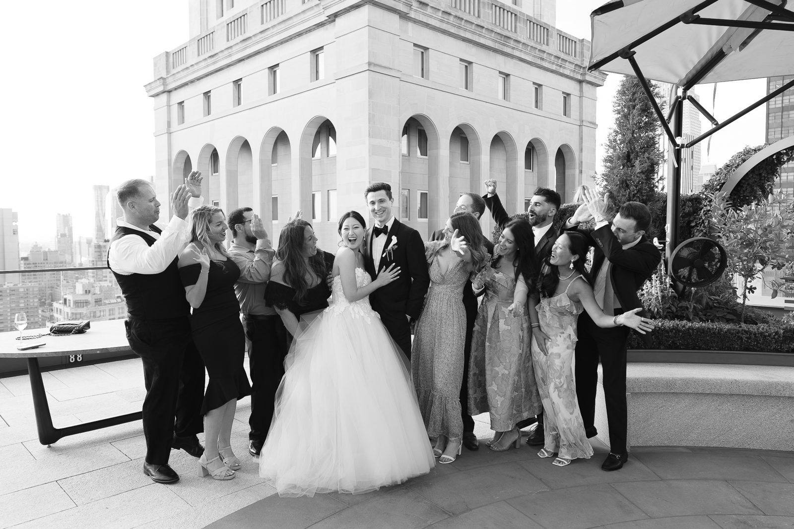 Family portraits at a Le Jardin sur Madison rooftop wedding