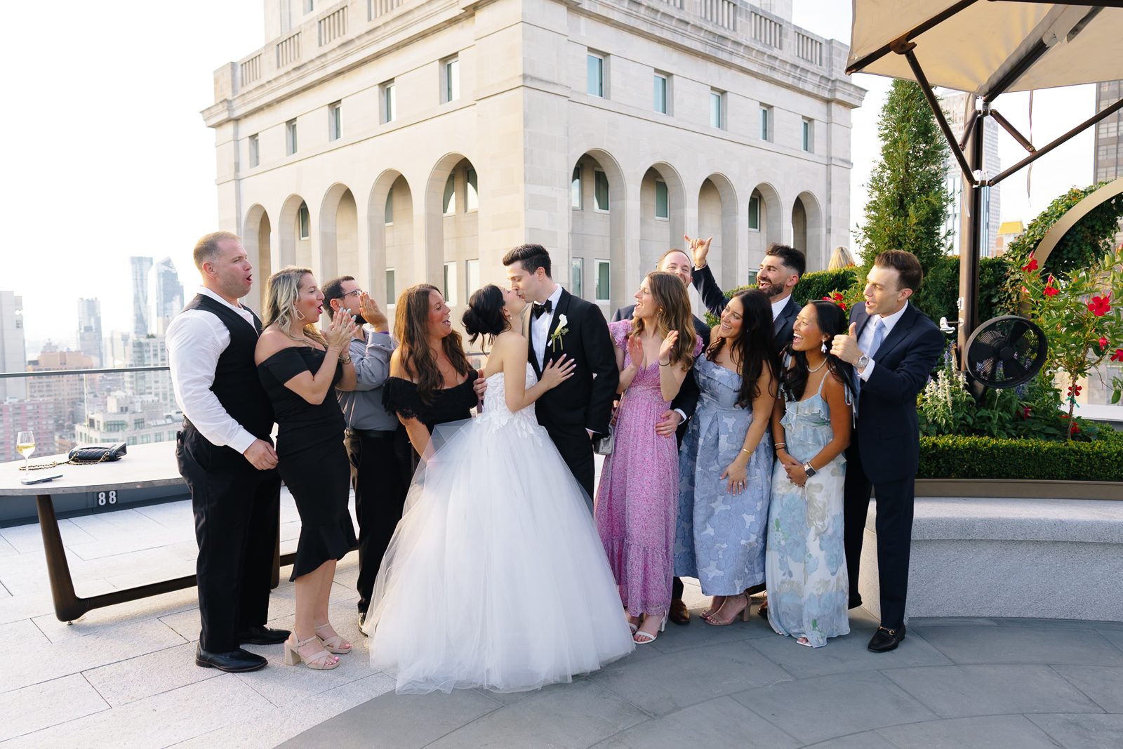 Family portraits at a Le Jardin sur Madison rooftop wedding