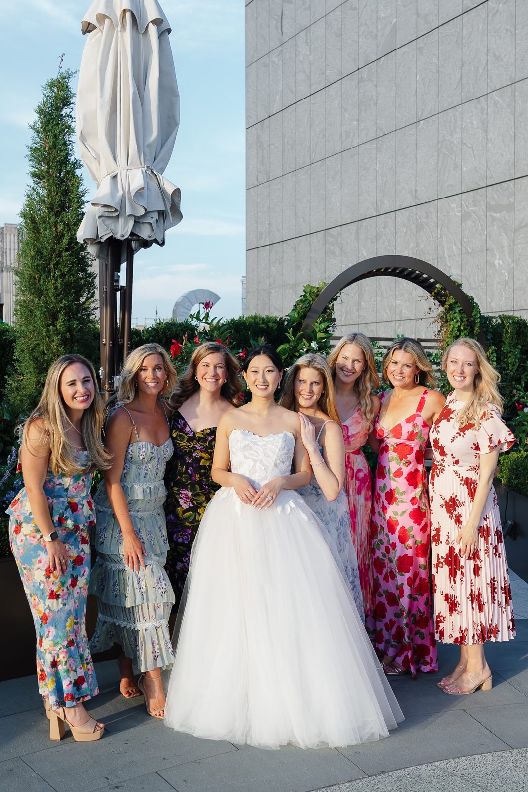 Family portraits at a Le Jardin sur Madison rooftop wedding