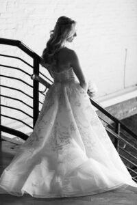 Bride on the industrial staircase of the Liberty Warehouse in black and white, Red Hook