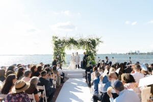 Outdoor Jewish wedding ceremony on the Liberty Warehouse deck over New York Harbor