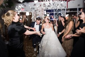 Petal toss on the dance floor at a Brooklyn wedding reception